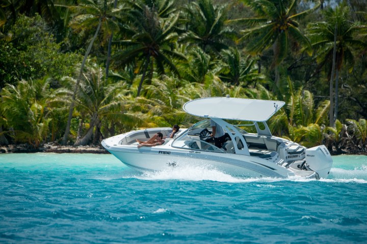 a small boat in a body of water