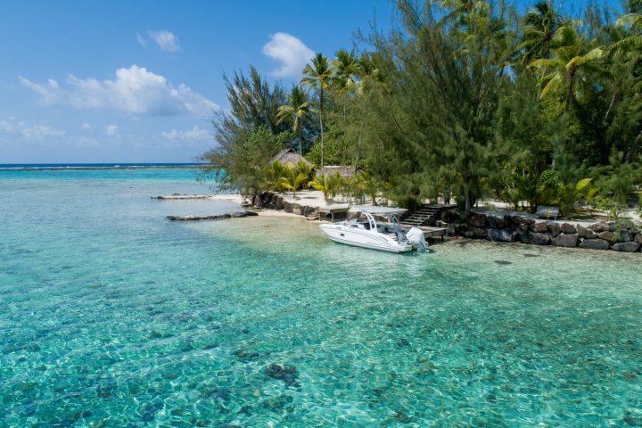 a boat docked at an island