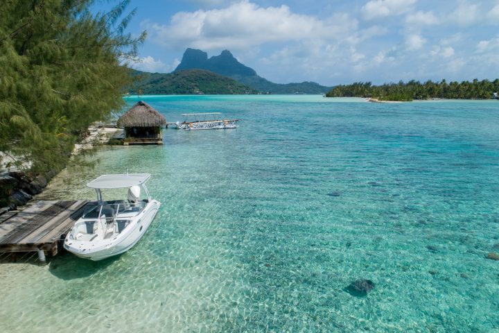 a small boat in a body of water